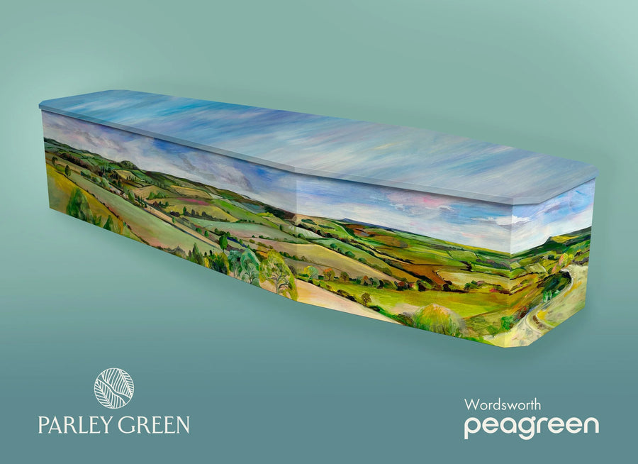 Wordsworth — Peagreen designer coffin, rolling hills beneath an open sky